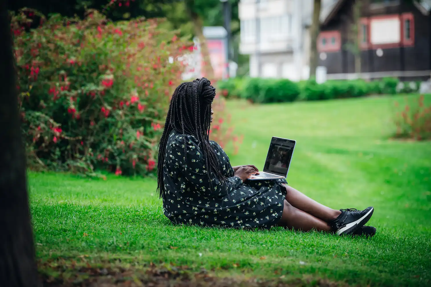 High-end native video content 3 Social media manager working in field on laptop